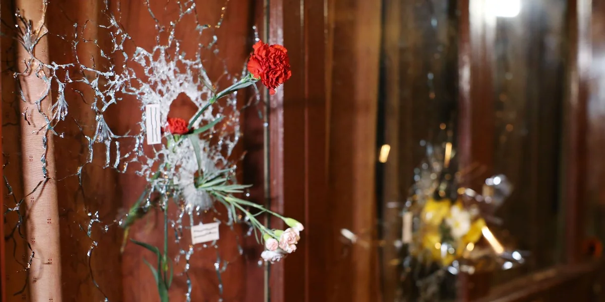 Schosslächer no den Attentater zu Paräis 2015 | © EPA/MALTE CHRISTIANS GERMANY