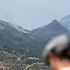 A Spuenie sinn déi nächst Stonnen entscheedend fir d'Bëschbränn an de Grëff ze kréien | © EPA/Fernando Villar